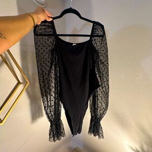 Sheer sleeved black bodysuit